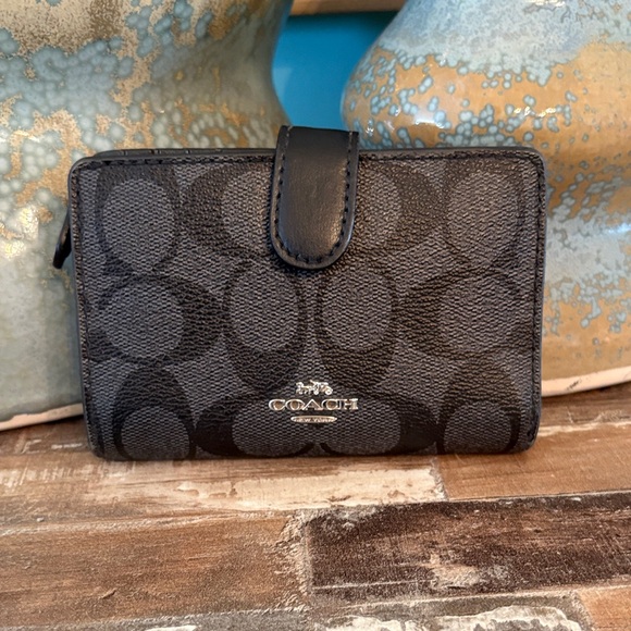 Coach Handbags - Coach Black Signature Bi-Fold Wallet with Silver Logo beautiful condition